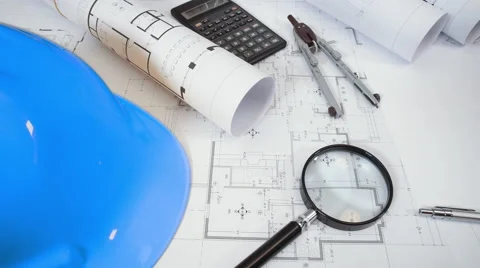Architectural drawings on desk Stock Footage 60632816