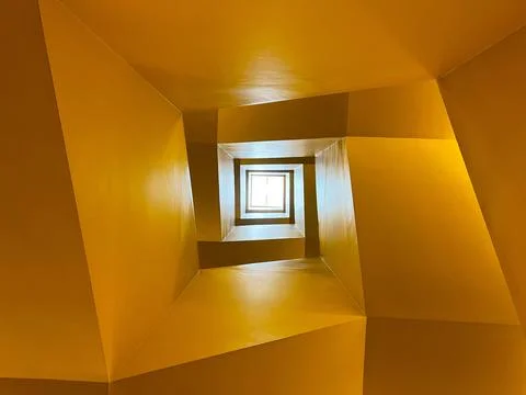 Architectural Elegance- Squared Spiral Staircase yellow Stock Photos