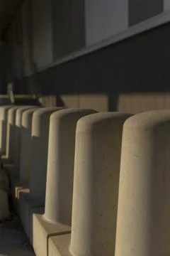 Architectural elements create mood through light and shadow contrast Stock Photos