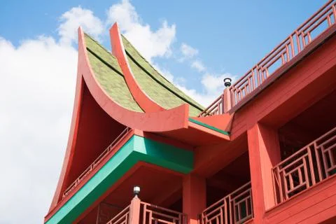 Architectural elements of a Southeast Asian building. Roof close-up. Against  写真素材