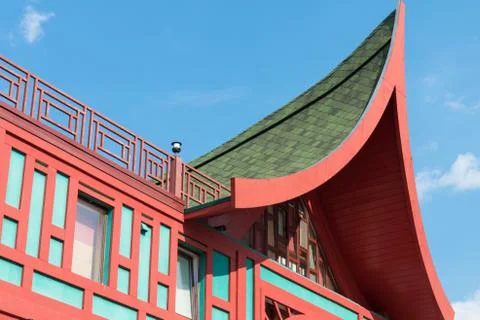 Architectural elements of a Southeast Asian building. Roof close-up. Against  스톡 사진