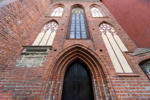 Architectural elements, vaults and windows of gothic cathedral, Red Brick wal Stock Photos
