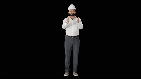 Architectural Engineer in White shirt and hard hat Talking to Camera, Alpha Stock Footage 130648074