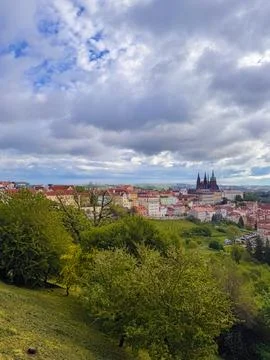 The architectural ensemble of Prague Castle, featuring St. Vitus Cathedral. Stock Photos