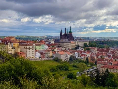 The architectural ensemble of Prague Castle, featuring St. Vitus Cathedral. Stock Photos