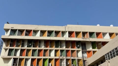 Architectural exterior with multicolored window shades and repetitive patte.. Stock Footage 333906863