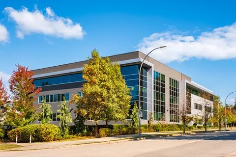 Architectural facade building with of glass elements. Exterior of a modern in Stock Photos