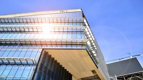 Architectural facade building with of glass elements. Stock Photos