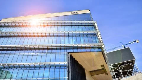 Architectural facade building with of glass elements. Stock Photos