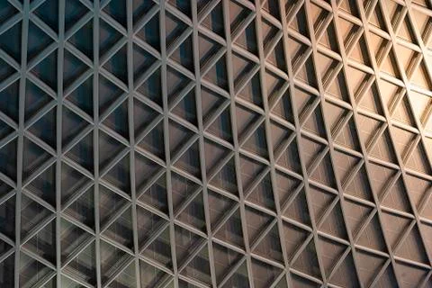 Architectural geometric triangular pattern with graduated lighting Fotos de archivo