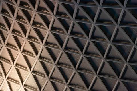 Architectural geometric triangular pattern with graduated lighting Stock Photos