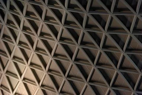 Architectural geometric triangular pattern with graduated lighting Stock Photos