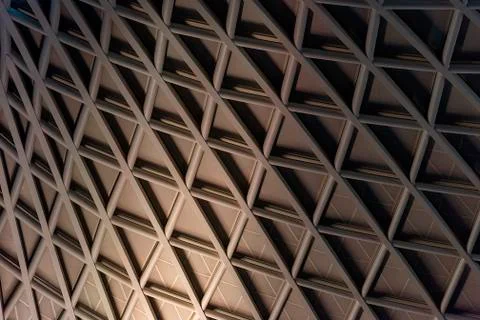 Architectural geometric triangular pattern with graduated lighting Fotos de archivo
