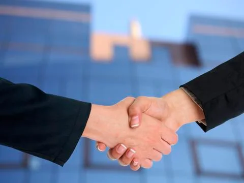 Architectural Handshaking in front of building Stock Photos