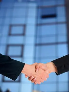 Architectural Handshaking in front of building Stock Photos