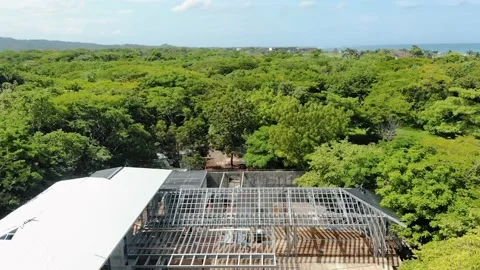 Architectural metallic roof structure, in remote green rural construction site Stock Footage 154834904