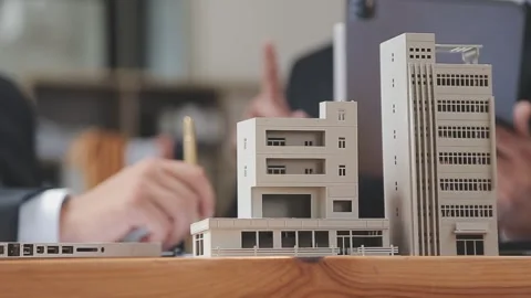 Architectural models on display at office desk presentation and planning Stock Footage 325308927