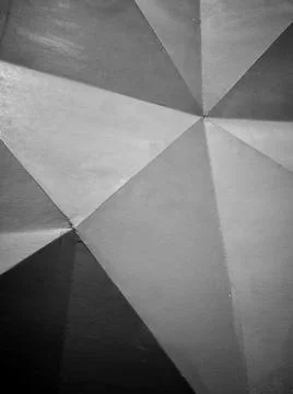 Architectural origami with grey triangles. Foto stock