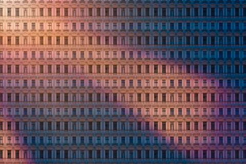 Architectural pattern, reflected evening sun on an old berlin house Stock Photos