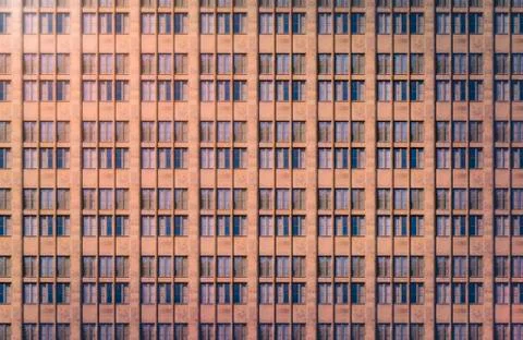 Architectural pattern, window facade with reflected light in the evening Foto stock