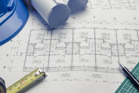 Architectural plans project drawing with blueprints rolls Stock Photos