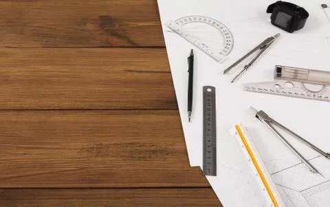 Architectural project, engineering tools on table. Stock Photos