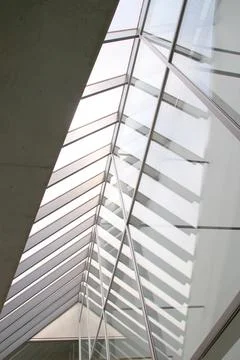 Architectural reflections from the interior of a minimalist building, closeup Stock Photos