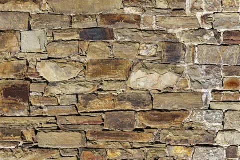 Architectural stone facing as a background image. Stock Photos