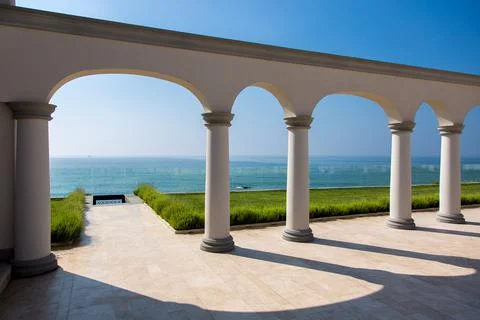 Architectural structure with arched openings and columns in classical Greek. Stock Photos