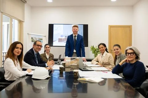 Architectural team collaborating on a new building project Stock Photos