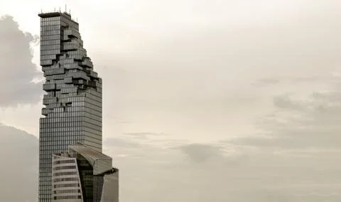 Architectural view of Angular geometric mirror cladding on a modern building Stock Photos