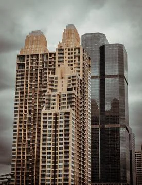 Architectural view of Overlapping at Two modern high-rise buildings with repe Stock Photos