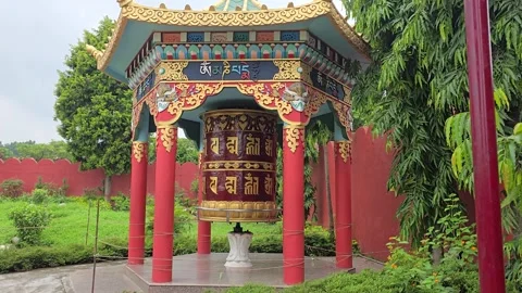 Architectural Zen: Discovering a Circular Buddha Sanctuary Stock Footage 317070619