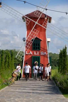 Architecture and Built Structure with Group of People, Sky, and Tower Stock Photos
