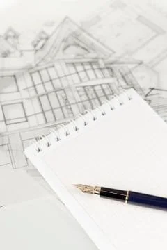Architecture blueprints and notepad and ink pen Stock Photos