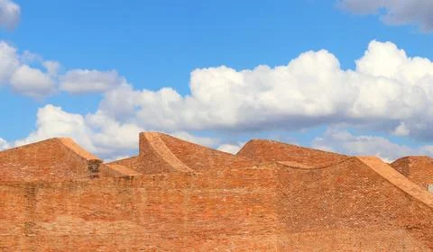 Architecture brick wall with sky background Stock Photos