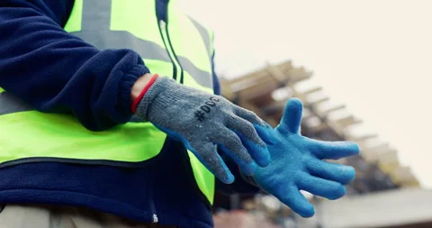 Architecture, builder and hands with gloves, outdoor and protection for manual Vídeos de archivo 336807179