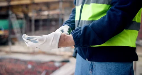 Architecture, builder and hands with gloves, building site and safety for manual Vídeos de archivo 337151438
