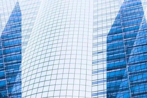 Architecture close up, windows of skyscraper. Glass and concrete. Urban lands Stock Photos