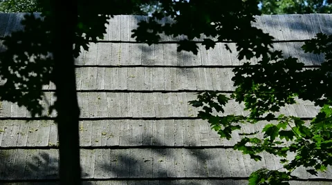 Architecture detail with old and weathered wooden roof tiles Stock Footage 65760655