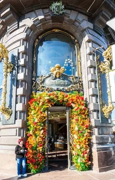 Architecture elements and mascaron over the entrance to the Book House stor.. Fotos Stock