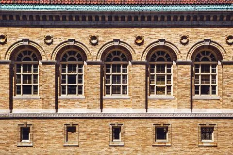 Architecture facade and windows of ancient renaissance style classical buildi Stock Photos
