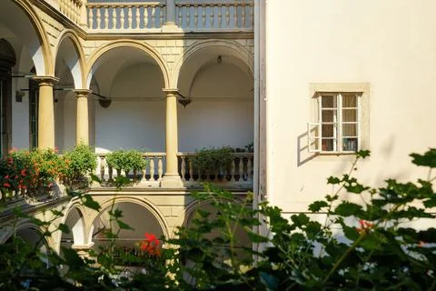 Architecture. Facade of beautiful building with colomn and balconies, and flo Foto stock