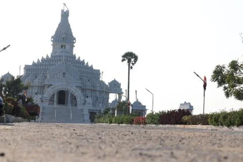 Architecture image of A buddha temple built in marble with clear sky and coco Stock Photos
