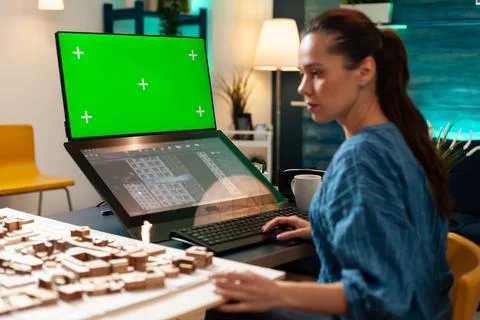 Architecture manager with design plan and green screen Foto stock