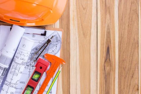 Architecture plan and rolls of blueprints with tool kit Foto stock