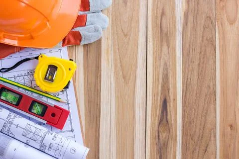 Architecture plan and rolls of blueprints with tool kit Foto stock