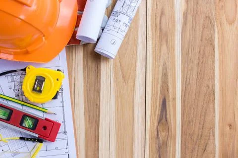 Architecture plan and rolls of blueprints with tool kit Foto stock
