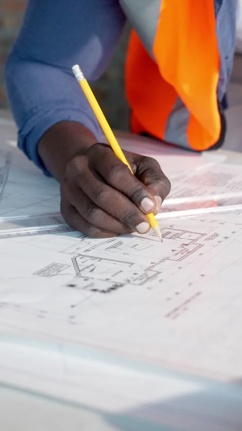 Architecture, ruler and hands of man with blueprint, design and layout for Stock Footage 337534860