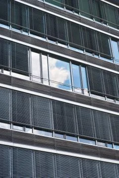 Architecture with sky and cloud reflection Stock Photos